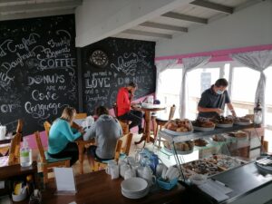people customer namibia 1877 doughnut bar swakopmund jetty cafe cake kuchen coffee berliner